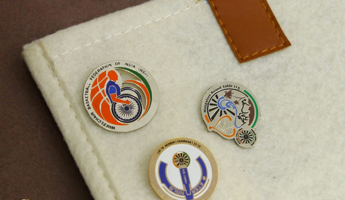 Rotary badge pin